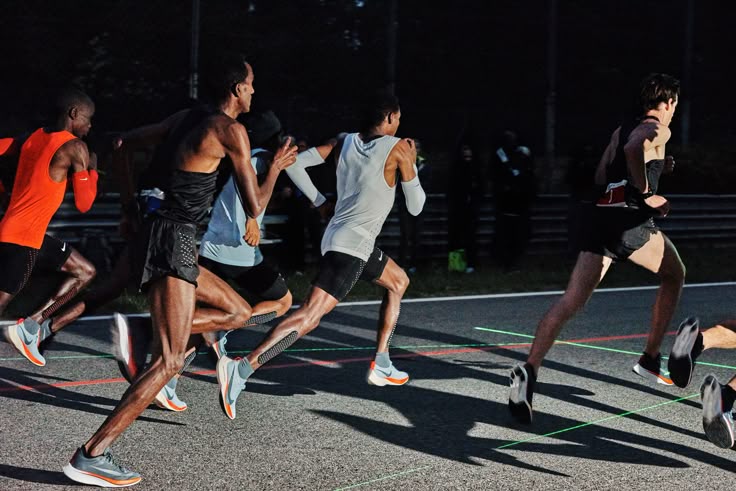 Group of diverse athletes running together in urban environment, showcasing the community aspect of Pacebeats running app